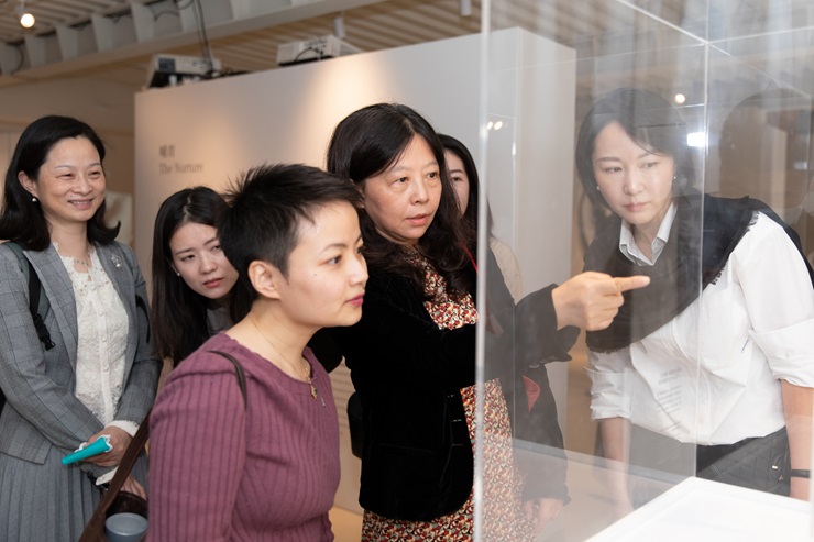 visitors are looking at The First Breast Medical Imaging Art Exhibition