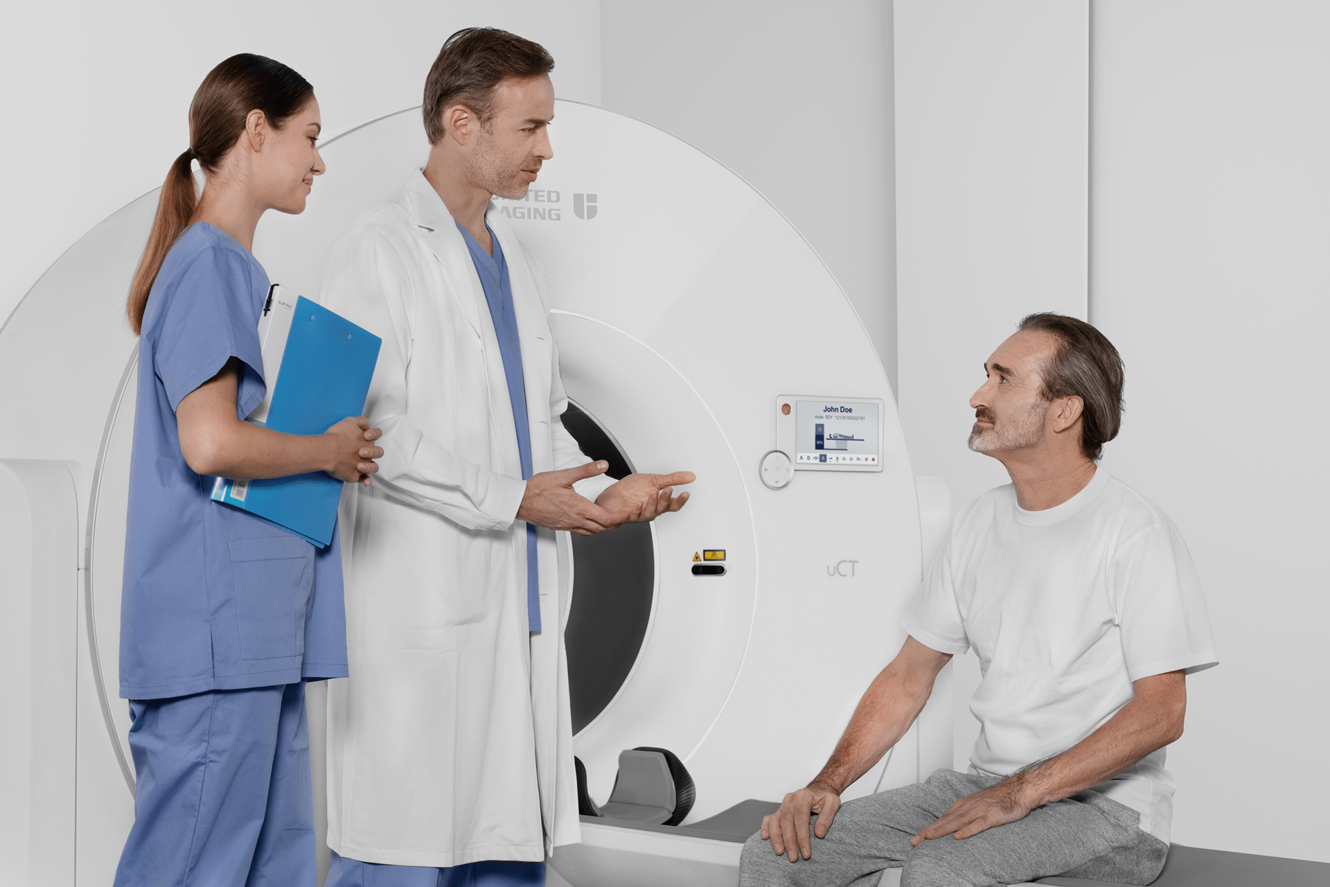 Two medical staff are doing checkup with a patient.